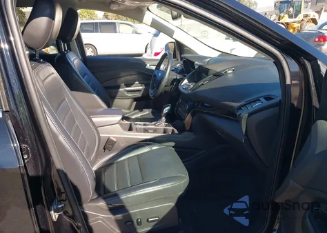 2019 Ford Escape Titanium z USA, uszkodzony, nr VIN 1FMCU0J94KUC55353